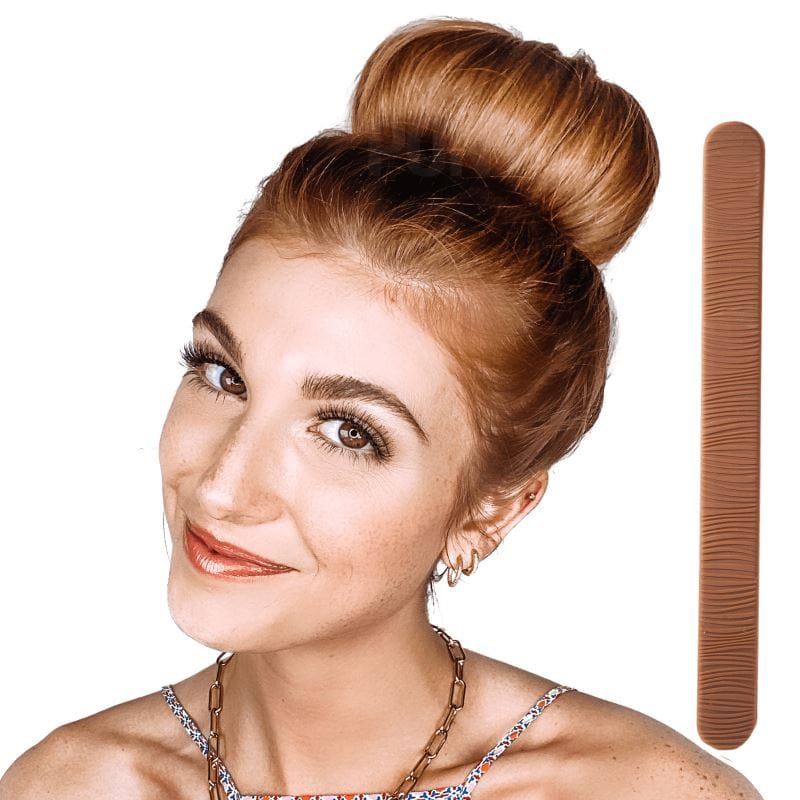 One copper color Bun Barz for hair buns. Joined at one end and open on the other, this hair accessory is designed to hide in the hair.