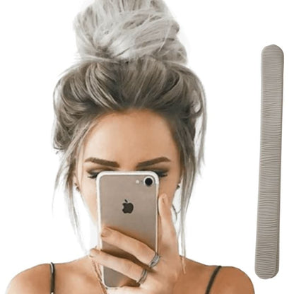 One gray color Bun Barz for hair buns. Joined at one end and open on the other, this hair accessory is designed to hide in the hair.