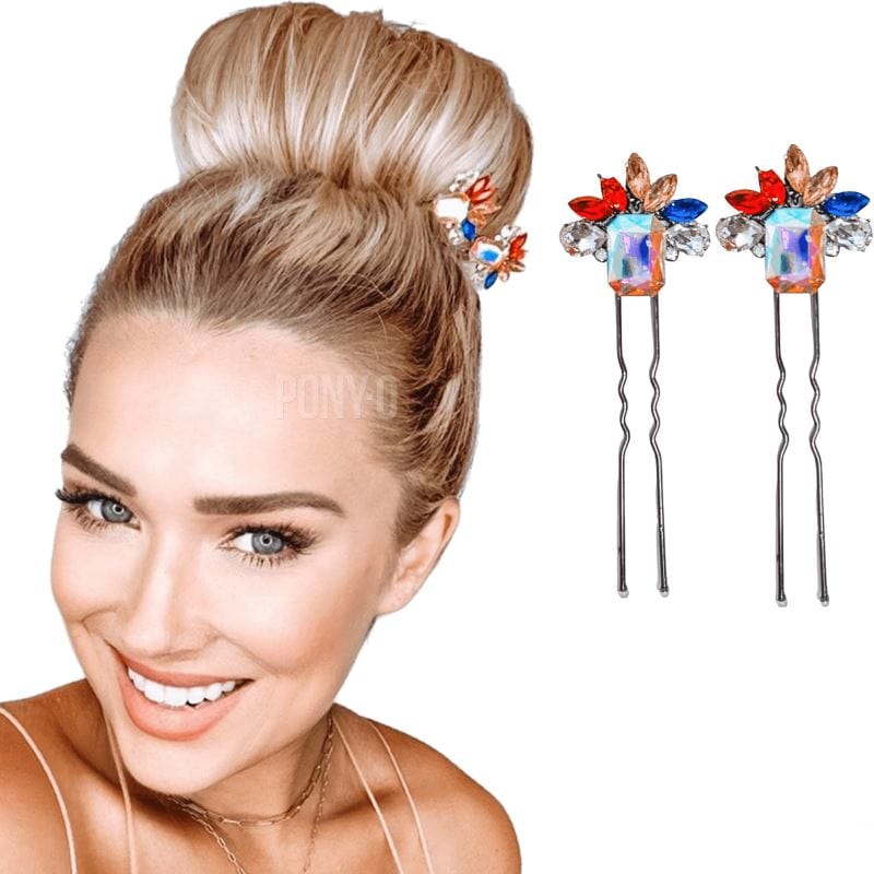 Two u-shaped hair pins with a rectangular tinted rhinestone, surrounded by a cluster colored rhinestones. 